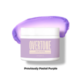 Overtone purple skincare product with a white label on a white background