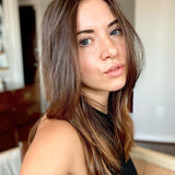 warm brown hair color on person with medium length hair