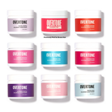 Grid of nine Overtone coloring conditioner jars in various shades including pastel purple, vibrant pink, extreme orange, vibrant magenta, vibrant teal, extreme pink, extreme purple, pastel pink, and pastel blue, each in a white jar with colored labels matching the hair dye shade