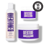 Overtone hair care products including a bottle and two jars on a white background.