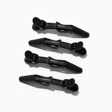 four black crocodile hair clips