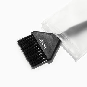 black hair color application brush in eco-friendly clear bag